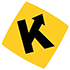 A yellow sign with a black letter k and an arrow pointing up